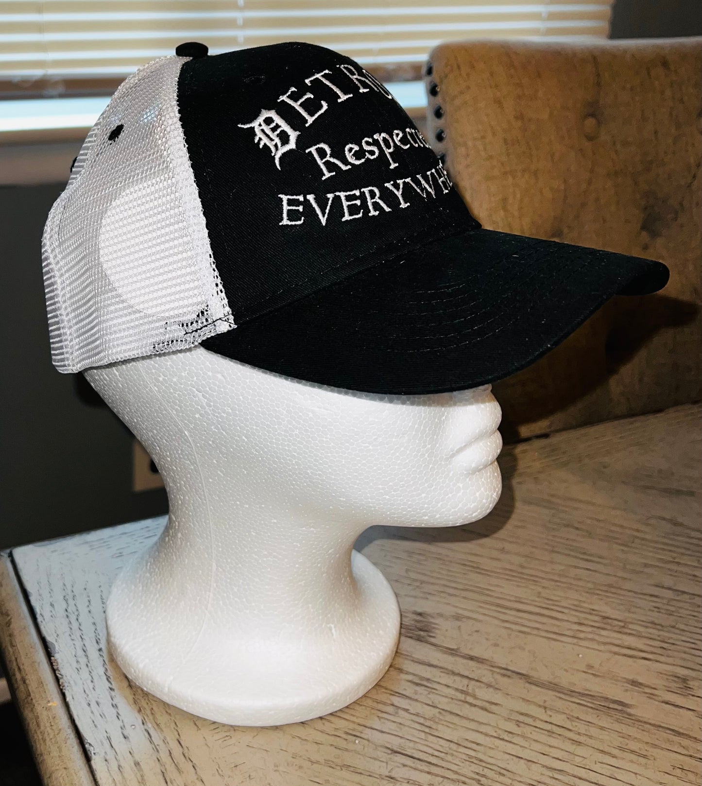 Respected Half Moon Trucker Hat Black